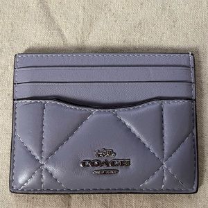 Coach Slim Id Card Case with puffy diamond quilting used. 4(L)X3(h) style#cj525